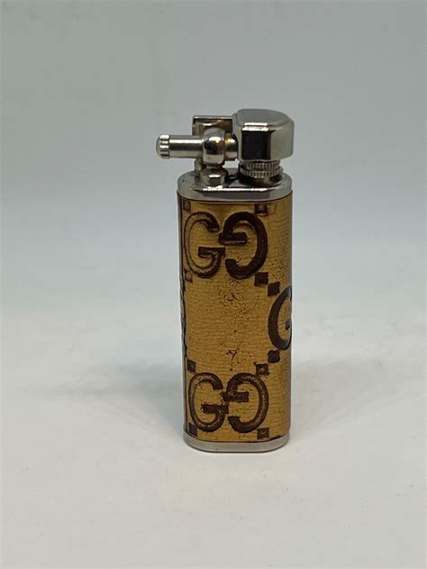 gucci lighter gold